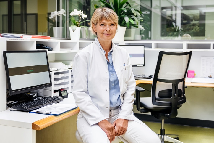 Health Care Professional standing in modern clinic