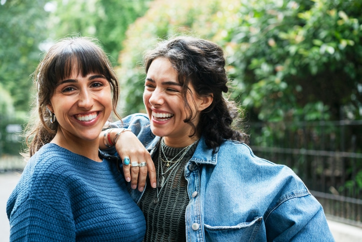 Two women laughing and enjoying each others company