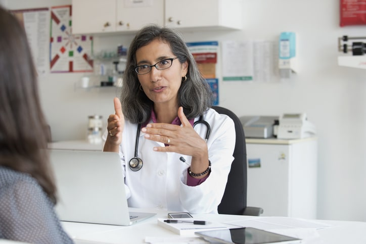 Health Care Professional standing in modern clinic