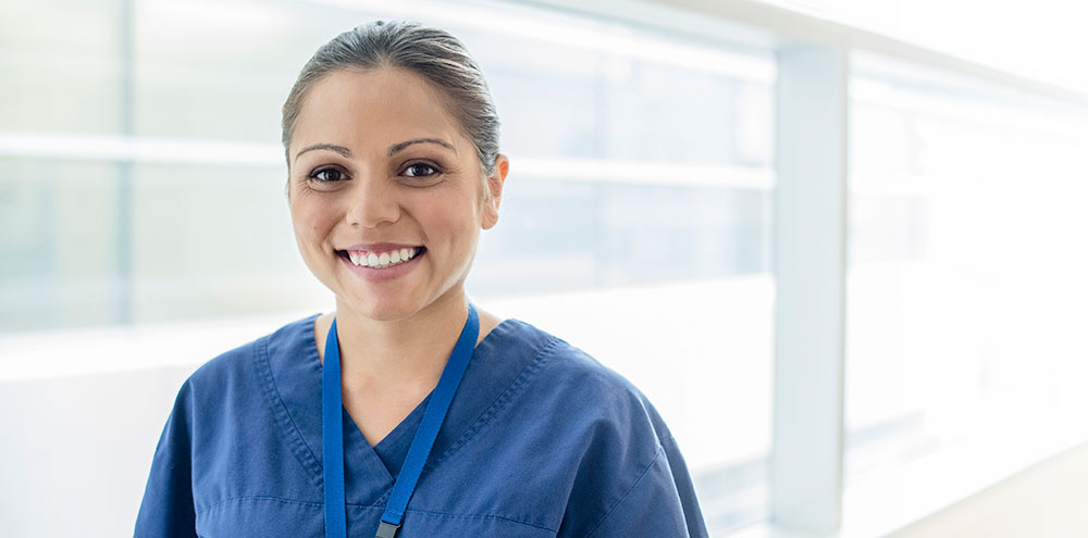 Portrait of nurse in corridor