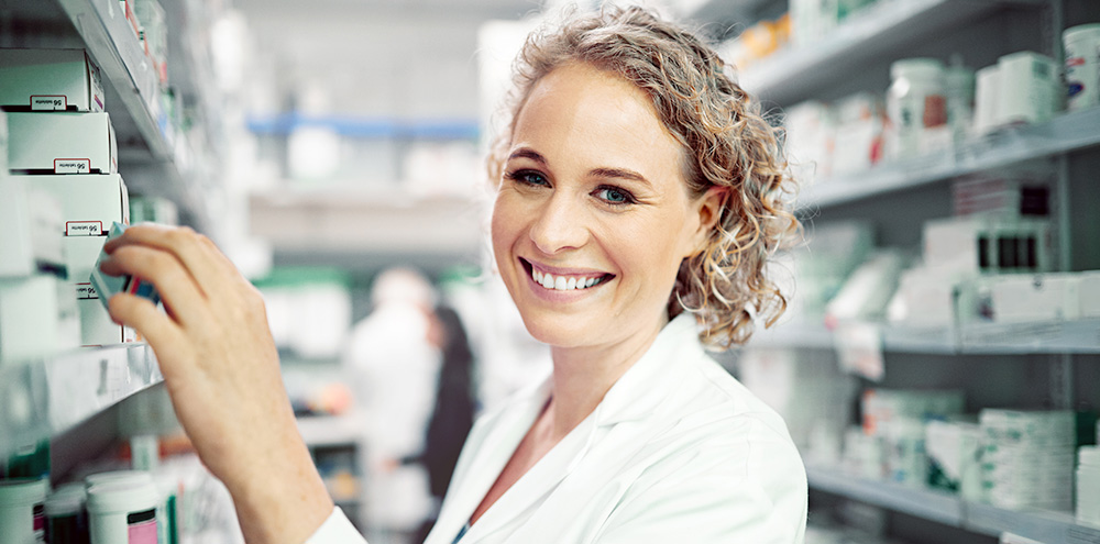 Portrait of pharmacist working in a pharmacy