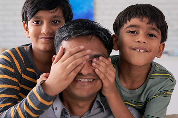 Man and two kids