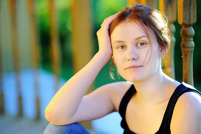 Woman looking into camera