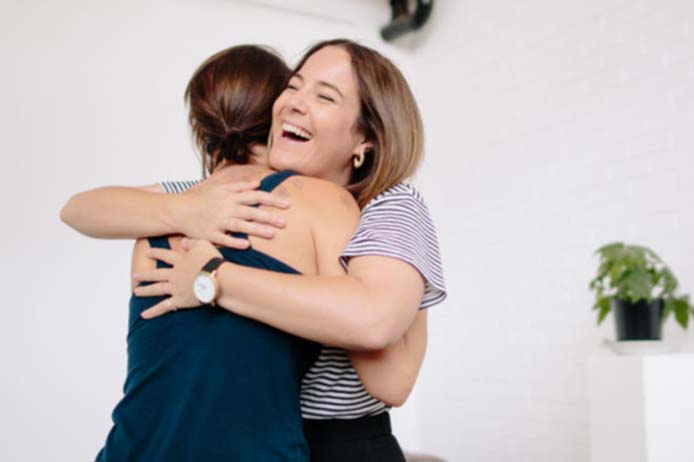 Women hugging