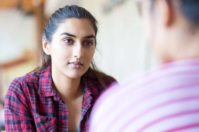 Woman in checkered shirt