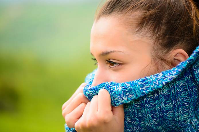 Woman in blue scarf