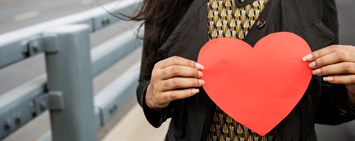 Woman holding heart